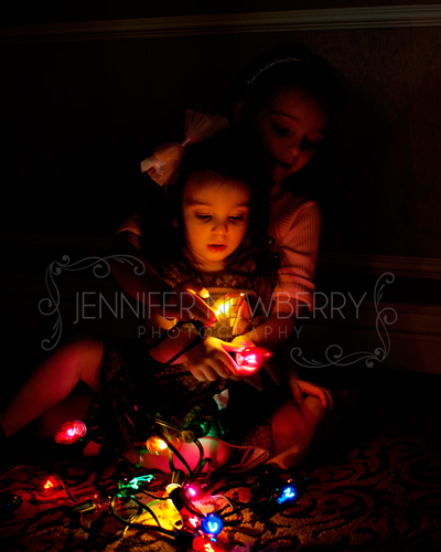 Kids with Christmas lights